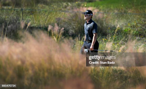 Austin Cook walks along the sixth hole during the final round of The RSM Classic at the Sea Island Resort Seaside Course on November 19, 2017 in Sea...