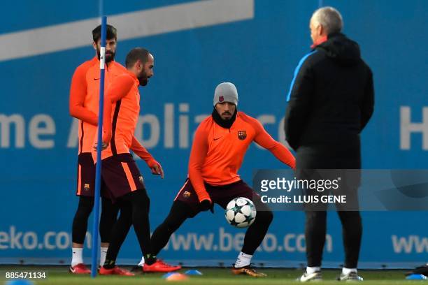 Barcelona's Uruguayan forward Luis Suarez takes part in a training session at the Sports Center FC Barcelona Joan Gamper in Sant Joan Despi, on...