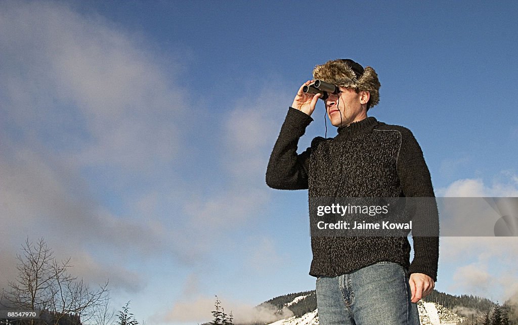 Man with binoculars