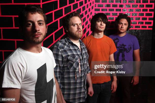 Farzad Houshiarnejad, James Harvey, Mike Cammarata and Ben Money of Drink Up Buttercup backstage before their performance at Santos Party House on...