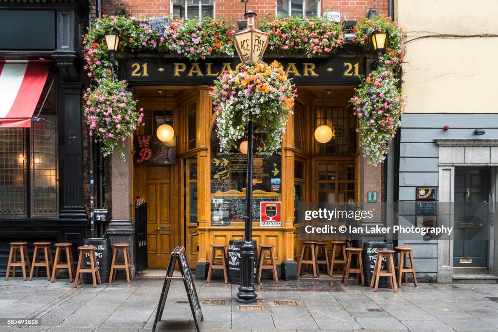 Dublin, Ireland. 21 August 2017. View of the Palace Bar with hanging baskets and stools in the Temple Bar area of Dublin, Southern Ireland.