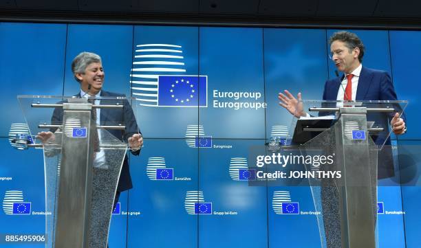 New Eurogroup President Portuguese Finance Minister Mario Centeno and former Dutch Finance Minister and parting Eurogroup president Jeroen...