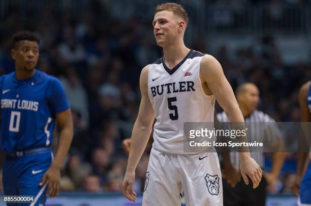 Butler Bulldogs guard Paul Jorgensen jokes with a official during the men's college basketball game between the Butler Bulldogs and Saint Louis...