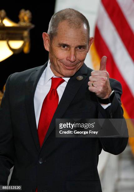 Rep. John Curtis gives a thumbs up before a event with U.S. President Donald Trump at the Rotunda of the Utah State Capitol on December 4, 2017 in...