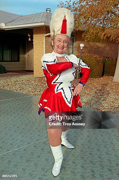 woman dressed as a drum majorette - drum majorette stock-fotos und bilder