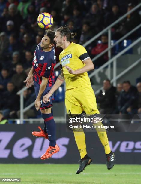 Andrea Nalini of Crotone competes for the ball with Gabriele Angella of Udinese during the Serie A match between FC Crotone and Udinese Calcio at...