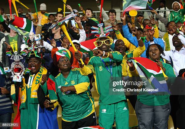 Fans of South Africa celebrate during the FIFA Confederations Cup match between South Africa and New Zealand at Royal Bafokeng Stadium on June 17,...
