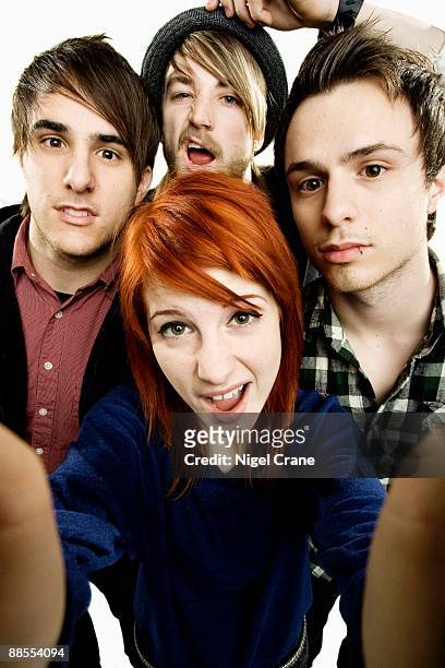 Posed studio group portrait of American rock band Paramore. Left to right are Zac Farro, Hayley Williams , Jeremy Davis and Josh Farro in London on...