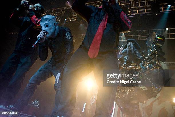 Chris Fehn, Corey Taylor, Shawn "Clown" Crahan and Joey Jordison of American metal band Slipknot perform on stage at the Cardiff International Arena...