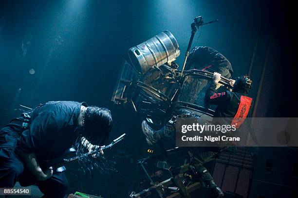 MIck Thomson and Shawn "Clown" Crahan of American metal band Slipknot perform on stage at the Hammersmith Apollo in London on December 2 2008.