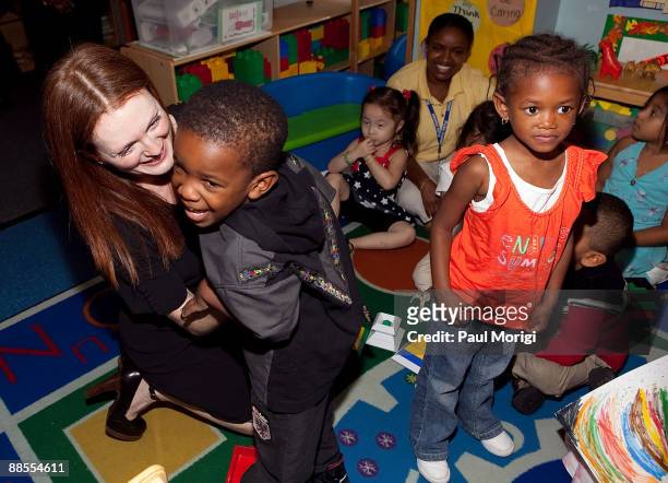 Julianne Moore, Artist Ambassador, Save the Children's U.S. Programs, talks with children at the "Disaster Decade: Lessons Unlearned For The United...
