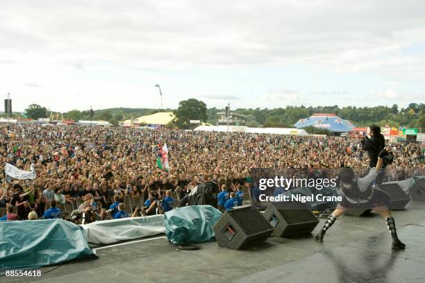 Lyn-Z, bending over backwards, and Jimmy Urine of American band Mindless Self Indulgence perform on stage at the Reading Festival, England on August...