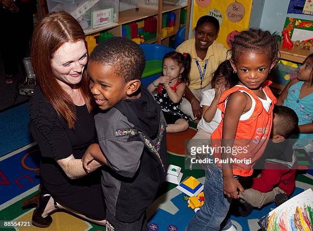 Julianne Moore, Artist Ambassador, Save the Children's U.S. Programs, talks with children at the "Disaster Decade: Lessons Unlearned For The United...