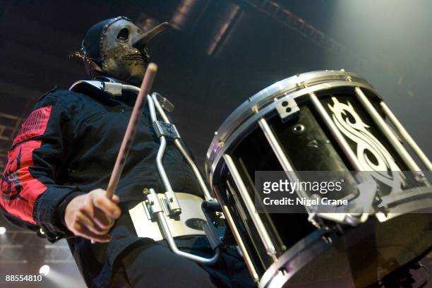 Chris Fehn percussionist of American metal band Slipknot performs on stage at the Cardiff International Arena in Cardiff, Wales on December 05 2008.