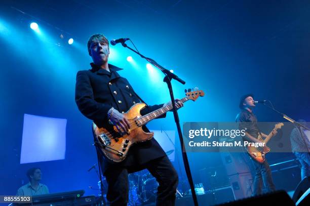 Dougie Payne and Fran Healy of Scottish band Travis perform on stage at the Muffathalle on February 8, 2009 in Munich, Germany.