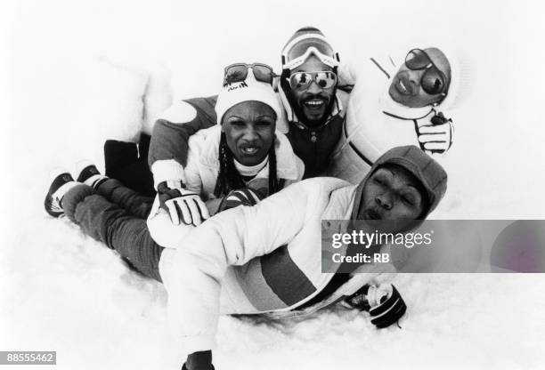 Boney M playing in the snow. Left to right are Marcia Barrett, Bobby Farrell, Maizie Williams and Liz Mitchell , circa 1980.