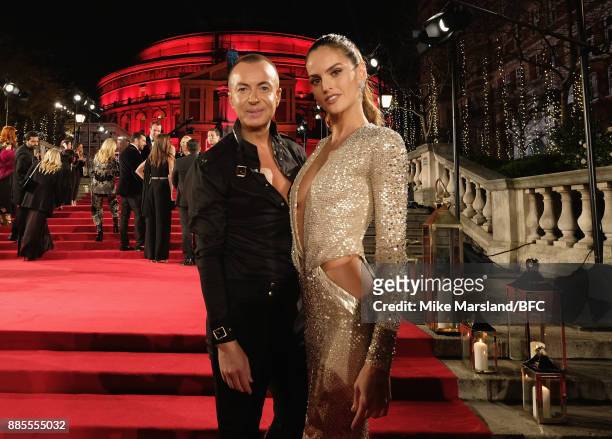 Julien Macdonald and Izabel Goulart attend The Fashion Awards 2017 in partnership with Swarovski at Royal Albert Hall on December 4, 2017 in London,...