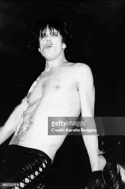 Lux Interior of The Cramps performs on stage at the Hammersmith Palais, London in 1984.