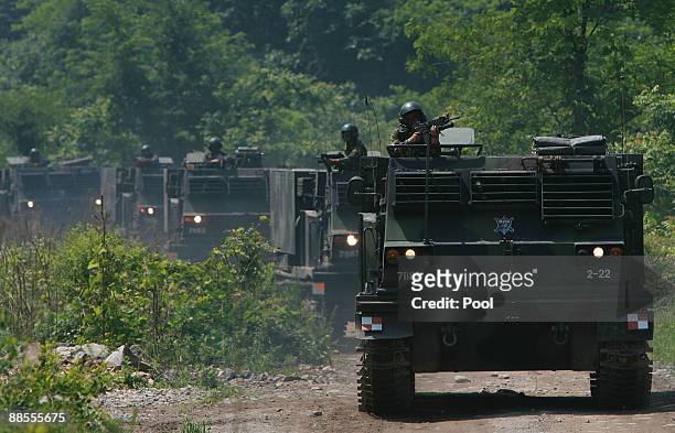 South Korean military soldiers take part in the live fire exercise, aims to prepare for the possible attack from North Korea on June 18, 2009 in...