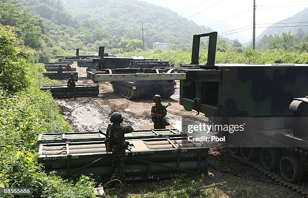 South Korean military soldiers take part in the live fire exercise, aims to prepare for the possible attack from North Korea on June 18, 2009 in...