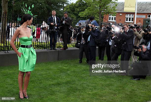 Photographers photograph Ladies Day fashions on The 3rd day of The Royal Meeting at Ascot Racecourse on June 18, 2009 in Ascot, England.