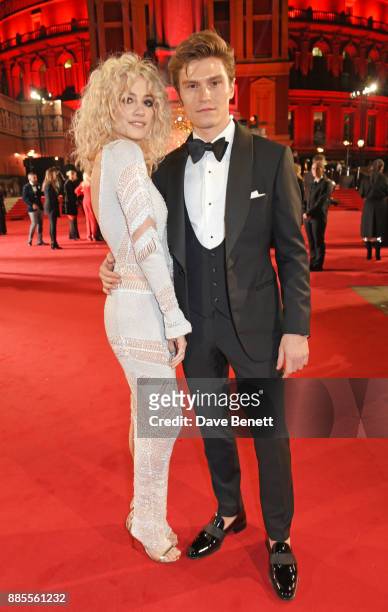 Pixie Lott and Oliver Cheshire attend The Fashion Awards 2017 in partnership with Swarovski at Royal Albert Hall on December 4, 2017 in London,...
