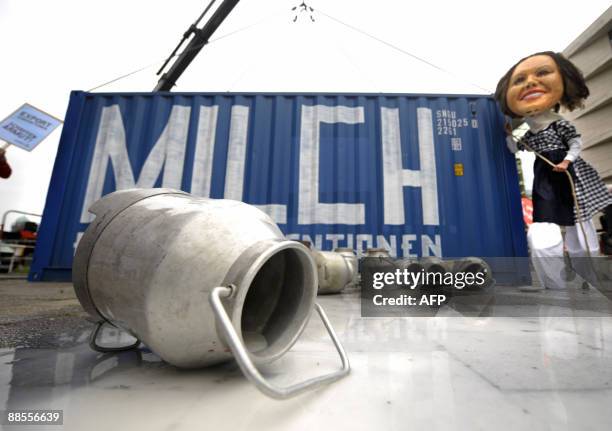 Milk has been spilt in front of the Department for Foreign Affairs in Berlin on June 18 where dairy farmers protest with a performance for a direct...