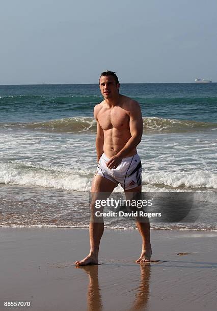 Tommy Bowe who has been selected for the British and Irish Lions team to play South Africa relaxes in the Indian Ocean off North Beach on June 18,...