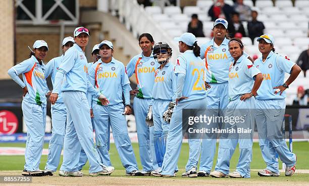 Indian players watch the big screen replay during the ICC Women's World Twenty20 Semi Final between India and New Zealand at Trent Bridge on June 18,...