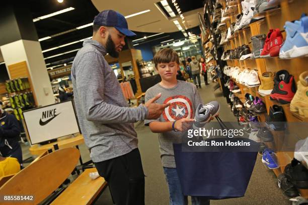 Cory Joseph of the Indiana Pacers particiaptes in the "Shop with the Pacers" christmas event at Circle Center Mall on December 3, 2017 in...