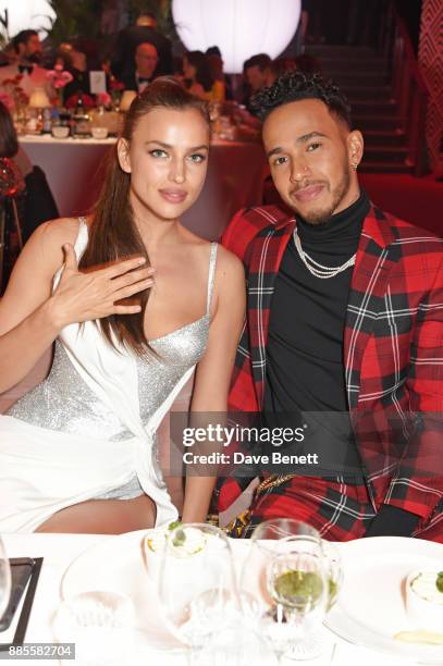 Irina Shayk and Lewis Hamilton attend a drinks reception ahead of The Fashion Awards 2017 in partnership with Swarovski at Royal Albert Hall on...