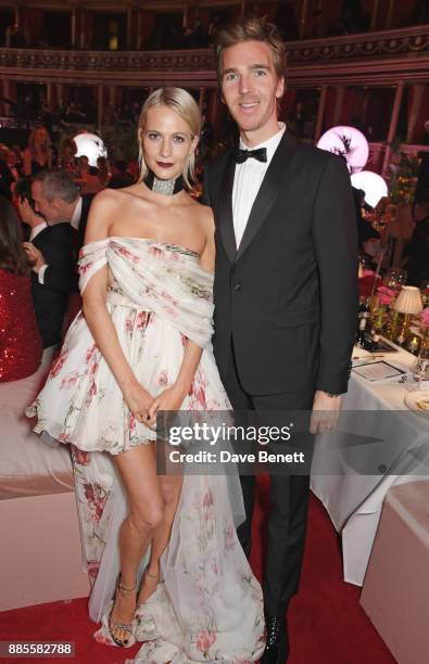 Poppy Delevingne and James Cook attend a drinks reception ahead of The Fashion Awards 2017 in partnership with Swarovski at Royal Albert Hall on...