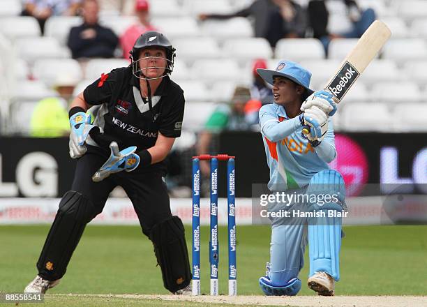 Mithali Raj of India hits out watched by Rachel Priest of New Zealand during the ICC Women's World Twenty20 Semi Final between India and New Zealand...