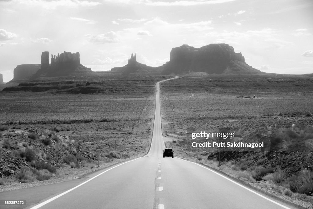 A Car Driving to Monument Valley on US-163