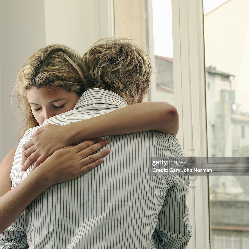 Young People Hugging High-Res Stock Photo - Getty Images