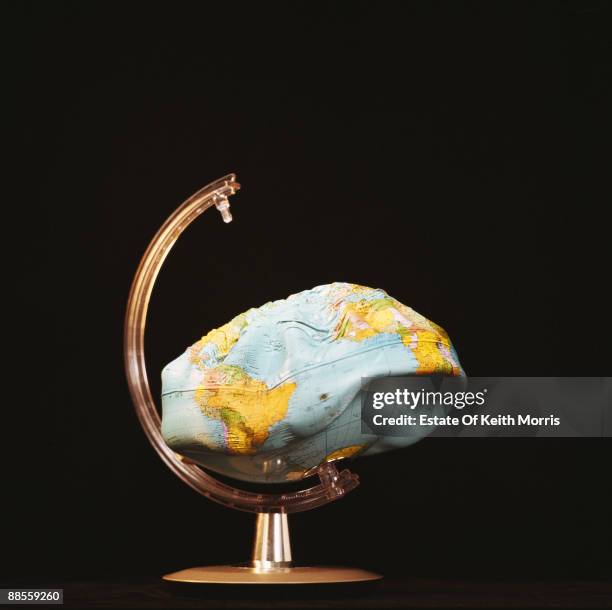 Punctured inflatable globe, circa 1990.