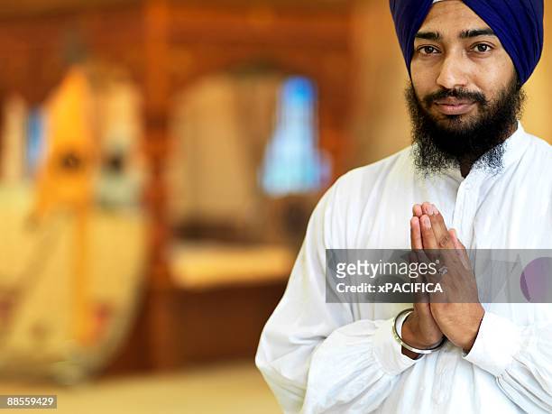 a portrait of a sikh musician - bracelet stock pictures, royalty-free photos & images