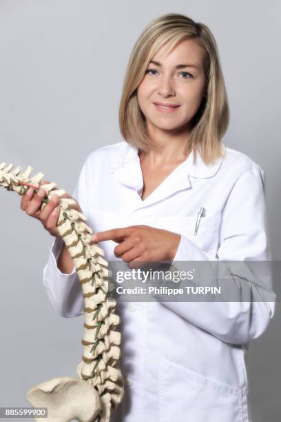 young female doctor - vertebras stock pictures, royalty-free photos & images