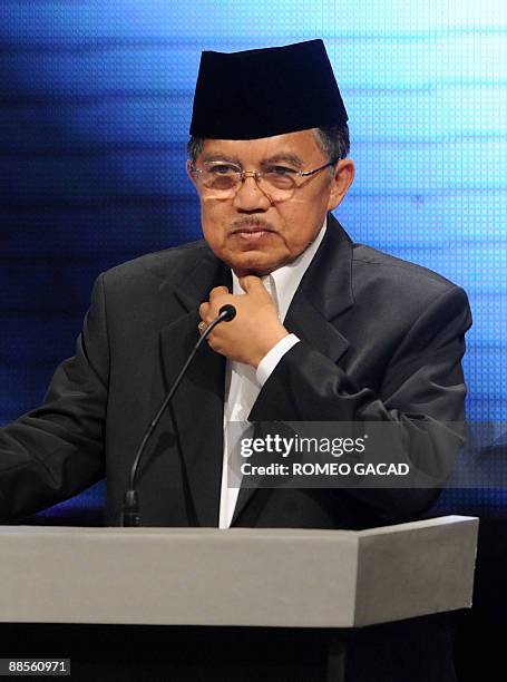 Vice President and Golkar Party leader Jusuf Kalla appears at the live televised debate between Indonesian President Susilo Bambang Yudhoyono and...