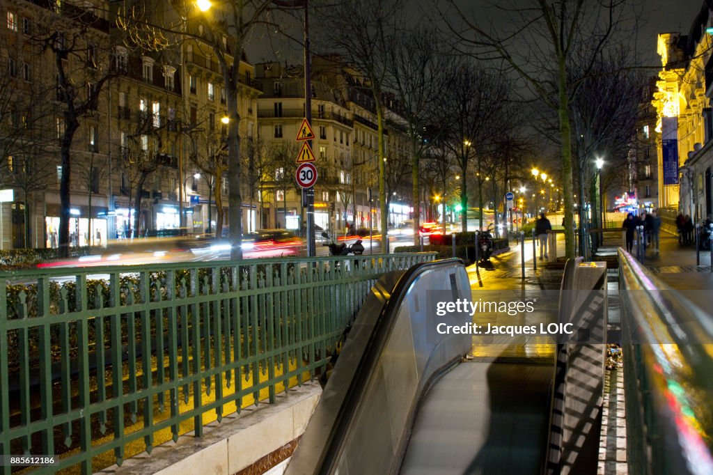 France, Paris, Avenue des Gobelins, Gobelins subway exit at night.