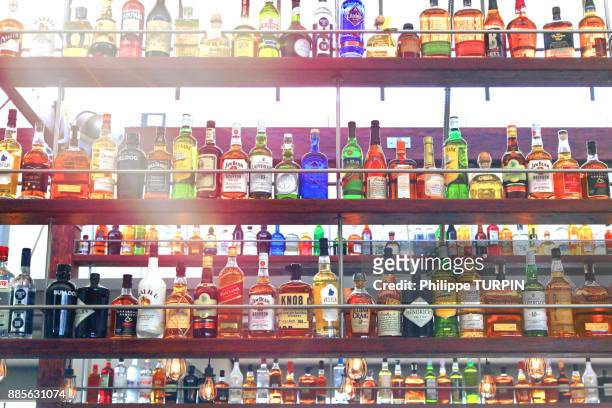alcools. - drink bottle stock pictures, royalty-free photos & images