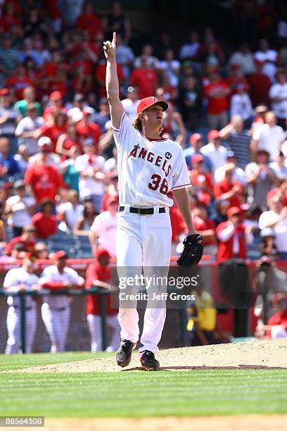 Pitcher Jered Weaver of the Los Angeles Angels of Anaheim reacts after pitching a complete game shut-out against the San Diego Padres at Angel...