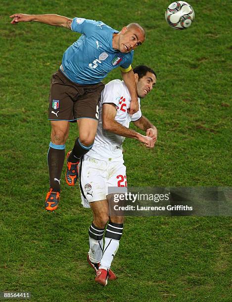 Fabio Cannavaro of Italy battles with Mohamed Aboutrika of Egypt during the FIFA Confederations Cup match between Egypt and Italy at Ellis Stadium on...