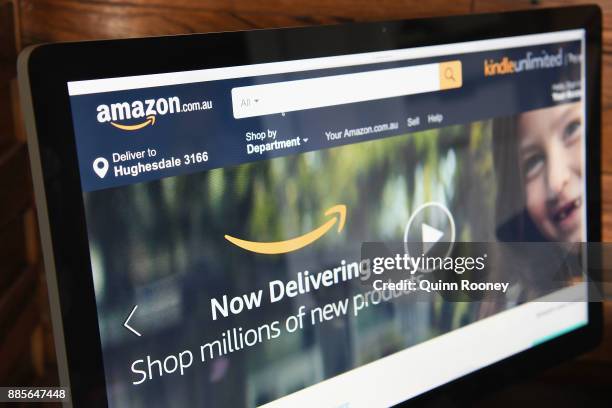 The Amazon website is seen on December 5, 2017 in Dandenong, Australia. Amazon has ended months of speculation by launching its local website...