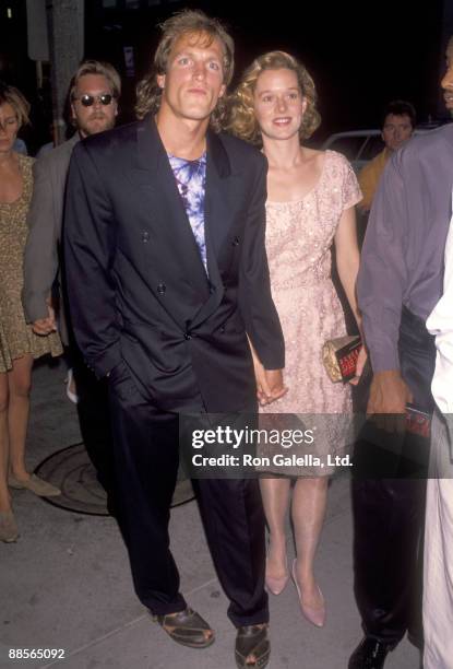 Actors Woody Harrelson and Penelope Ann Miller attend the "Die Hard 2" Westwood Premiere on July 2, 1990 at Avco Center Cinemas in Westwood,...