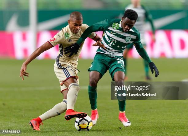 Joseph Paintsil of Ferencvarosi TC competes for the ball with Loic Nego of Videoton FC during the Hungarian OTP Bank Liga match between Ferencvarosi...