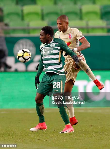 Joseph Paintsil of Ferencvarosi TC fights for the ball with Loic Nego of Videoton FC during the Hungarian OTP Bank Liga match between Ferencvarosi TC...