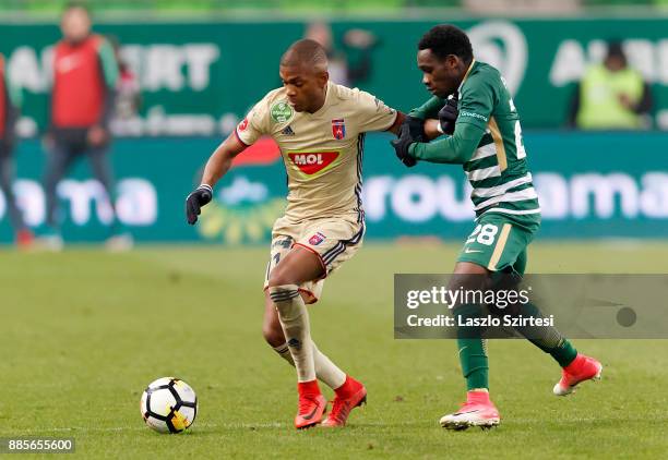 Joseph Paintsil of Ferencvarosi TC fights for the ball with Loic Nego of Videoton FC during the Hungarian OTP Bank Liga match between Ferencvarosi TC...