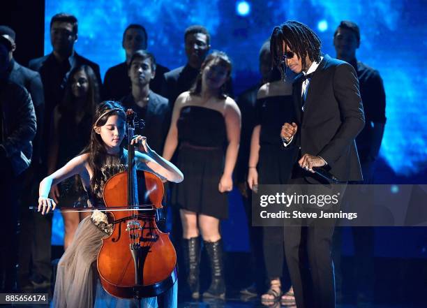 Musician Nana Ou-Yang and rapper Wiz Khalifa perform onstage during the 2018 Breakthrough Prize at NASA Ames Research Center on December 3, 2017 in...