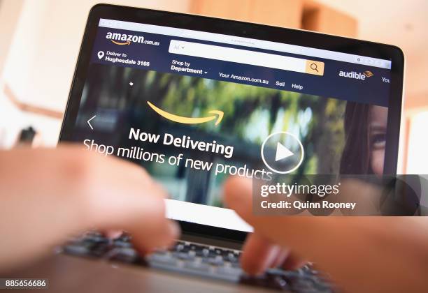 The Amazon website is seen on December 5, 2017 in Dandenong, Australia. Amazon has ended months of speculation by launching its local website...